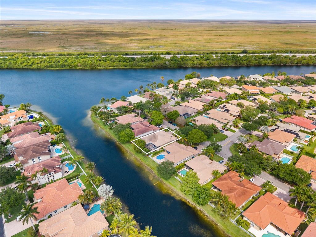 Photo of 12420 NW 50th Place, Coral Springs, FL 33076 (MLS # B26025772)