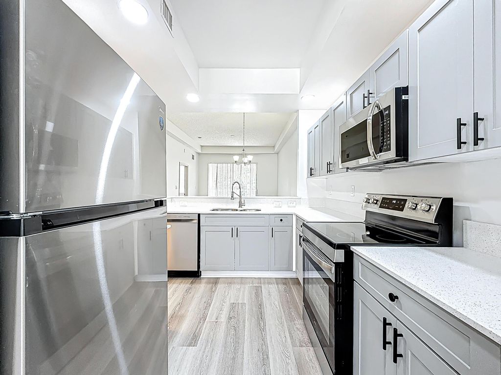 Photo of 3180 N Haverhill Road #102, West Palm Beach, FL 33417 (MLS # B26014626)