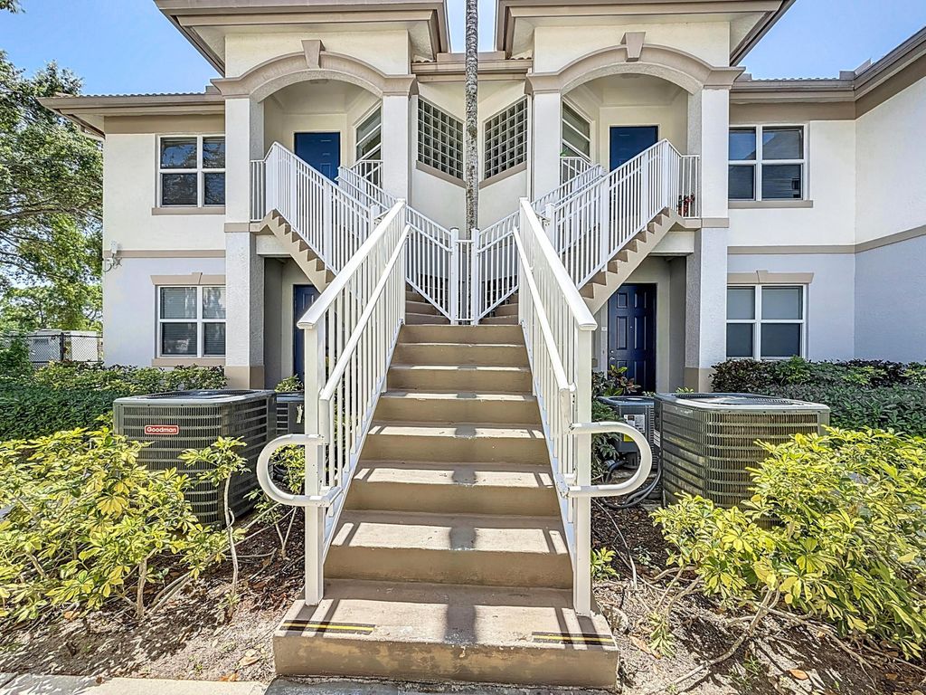Photo of 3180 N Haverhill Road #102, West Palm Beach, FL 33417 (MLS # B26014626)