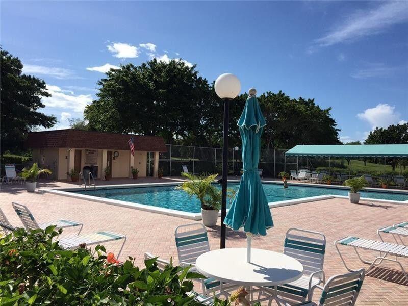 LARGE and all re done 2/2 + DEN, or Office or a true 3rd Bedroom. at the low price East Boca, minutes from I-95, beaches, parks, shopping and more. Enjoy this immaculate, two-bedroom, two-bath condominium with a versatile den that can be a home office or third bedroom with reserved parking spot in front of the building. Italian tile throughout, all new kitchen appliances, beautiful cabinetry, updated bathrooms and full side by side washer & dryer. Step outside to your peaceful private covered patio, screened for your enjoyment overlooking green space. Beautiful pool and minuets to beach and to Boca's Mizner Park and Delray's famous Atlantic Ave. See today.. USE RENT SPREE LIMKhttps://apply.link/V7snyDI