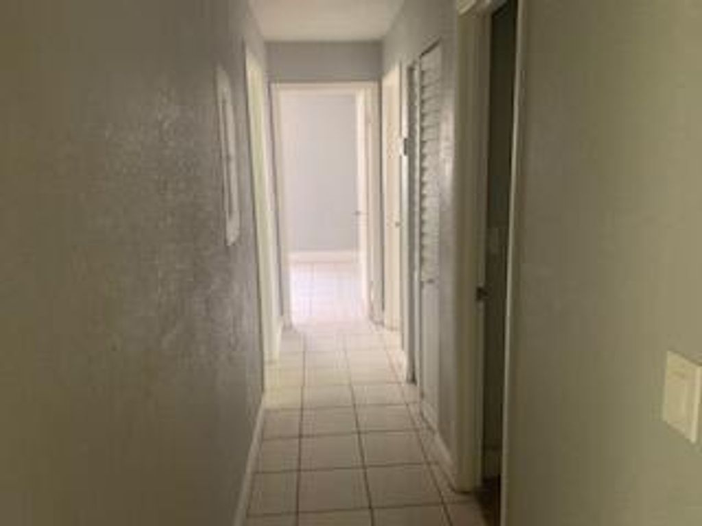 Photo of 1489 N Mangonia Circle, West Palm Beach, FL 33401 (MLS # R11010661)
