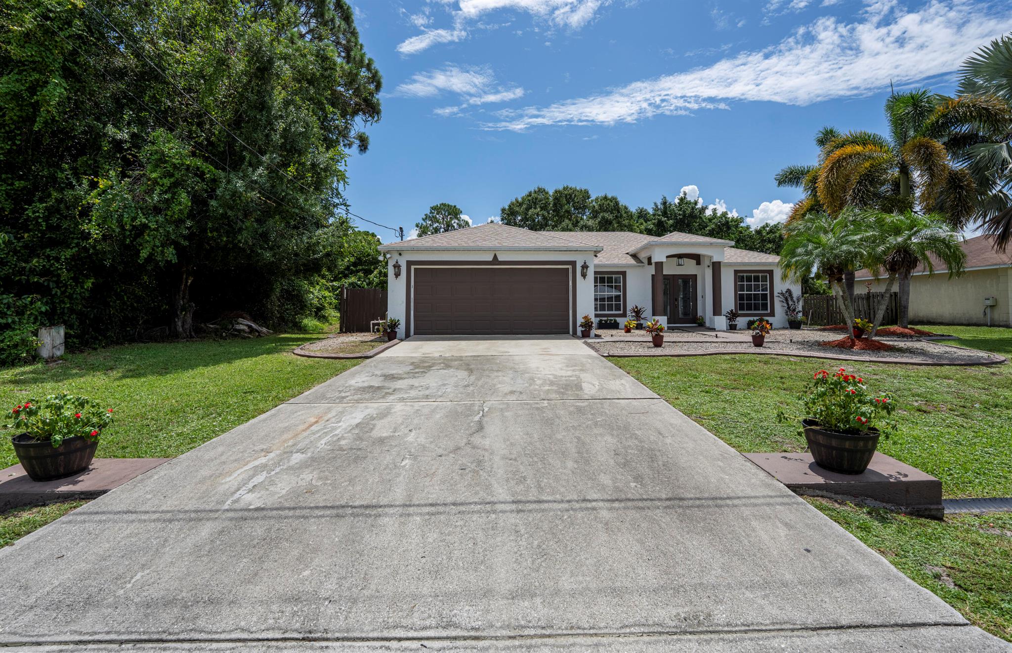 Come home to this beautiful CBS 3/2 open floor plan home with bonus room, new roof 2025 & A/C recently serviced stainless steel appliances. Sprinkler system, hurricane shutters. Primary bath has double sinks, garden tub with a separate shower. Low maintenance fenced in yard with a shed and room for a pool. Plenty of space for entertaining inside and out. Assumable mtg at 5.25% for 30yrs.Near shopping, Traditions, restaurants, Bass Pro Shop & Home Depot. Convenient to both 95 & Turnpike for commuters. SELLERS ARE MOTIVATED BRING ALL OFFERS & Will consider some closing assistance.