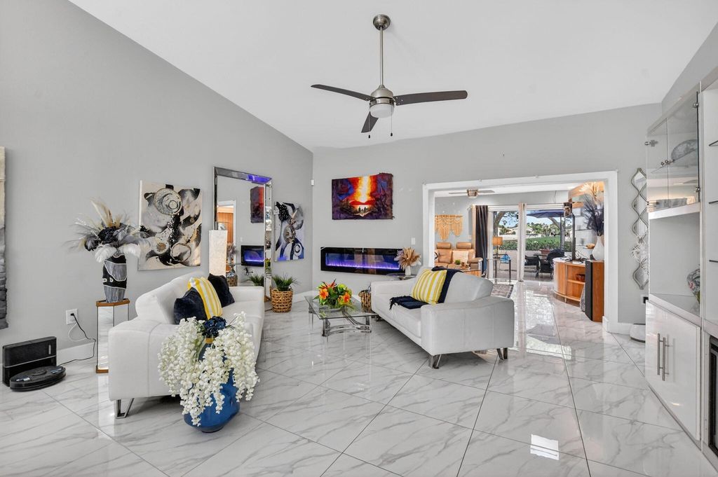 Photo of 2683 N Deer Creek Emerald Way Way N, Deerfield Beach, FL 33442 (MLS # B26002178)