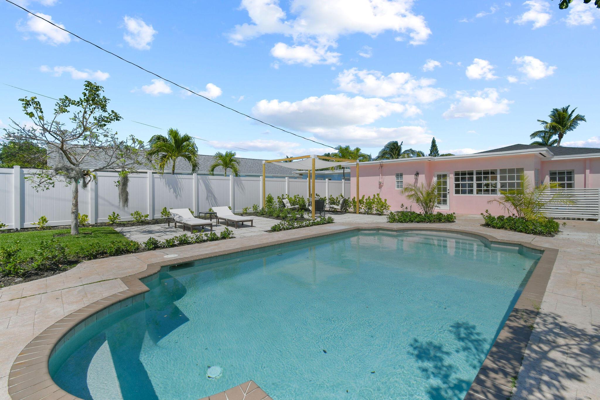 Step into the charm of coastal living with this beautifully updated 2-bedroom, 2-bath cottage, complete with a flexible den that can serve as a 3rd bedroom, office, or creative space. This light-filled home blends modern finishes with the warmth and character of a true Florida beach cottage. Enjoy bright, open living spaces, perfect for relaxing or entertaining, and step outside to a spacious backyard featuring a private pool surrounded by tropical landscaping - your personal oasis for year-round enjoyment.Located just blocks from the Intracoastal Waterway and only minutes from the beach, local shops, and vibrant dining, this home offers the best of laid-back coastal charm and convenience. Available for annual rental