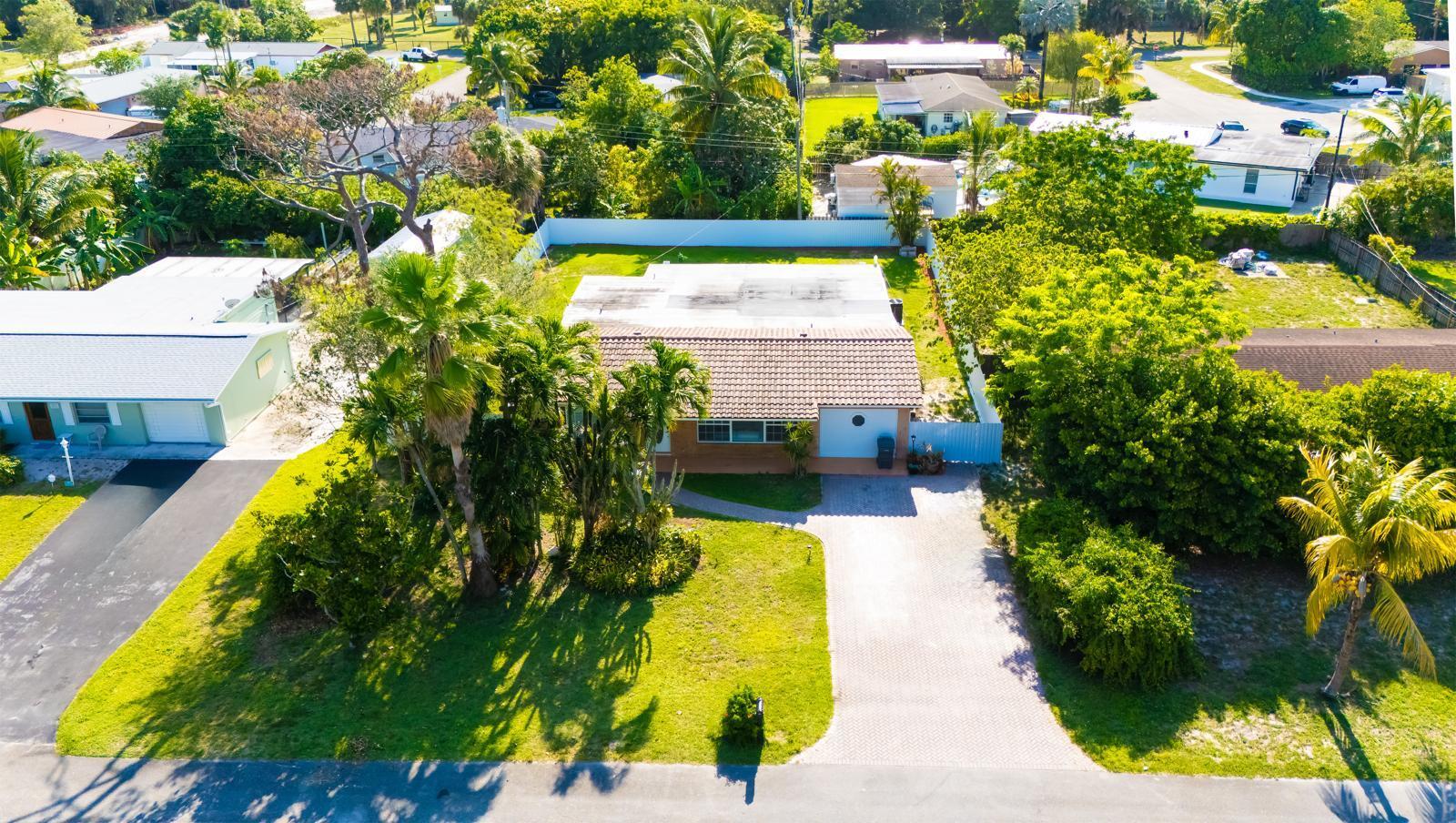 Welcome to your dream home in one of the most desirable areas of West Palm Beach! This spacious 4-bedroom, 2-bathroom residence offers the perfect blend of comfort and style. Enjoy Florida living at its finest with a sparkling private pool, ideal for relaxing or entertaining family and friends. The property features impact windows and doors for peace of mind and energy efficiency. With an open layout, plenty of natural light and a prime location close to shopping, dining, schools and major highways, this home is a true gem. Don't miss the opportunity to own a home in this excellent neighborhood- schedule your private showing today,