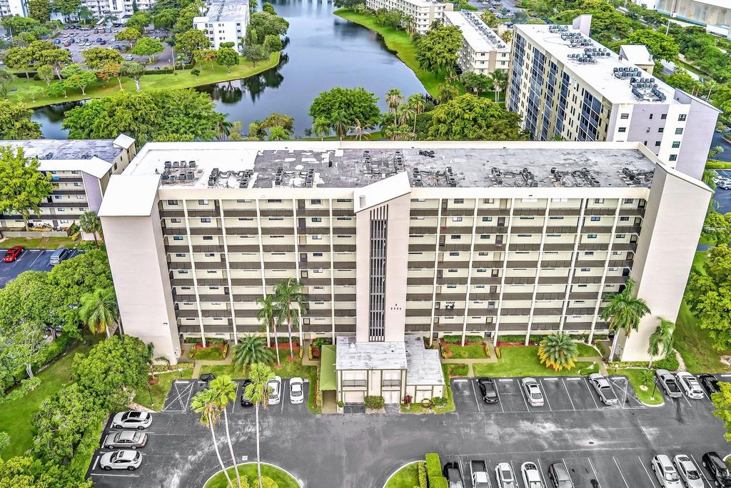 Photo of 2205 S Cypress Bend Dr #407, Pompano Beach, FL 33069 (MLS # F10392950)