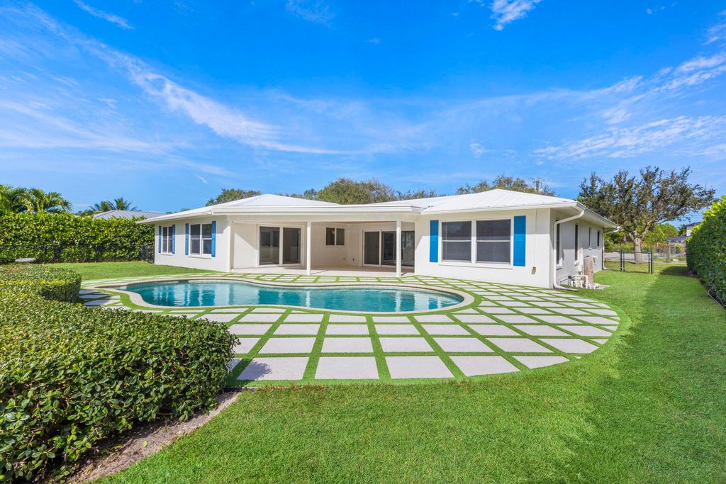 Photo of 253 Country Club Drive, Tequesta, FL 33469 (MLS # R10942308)