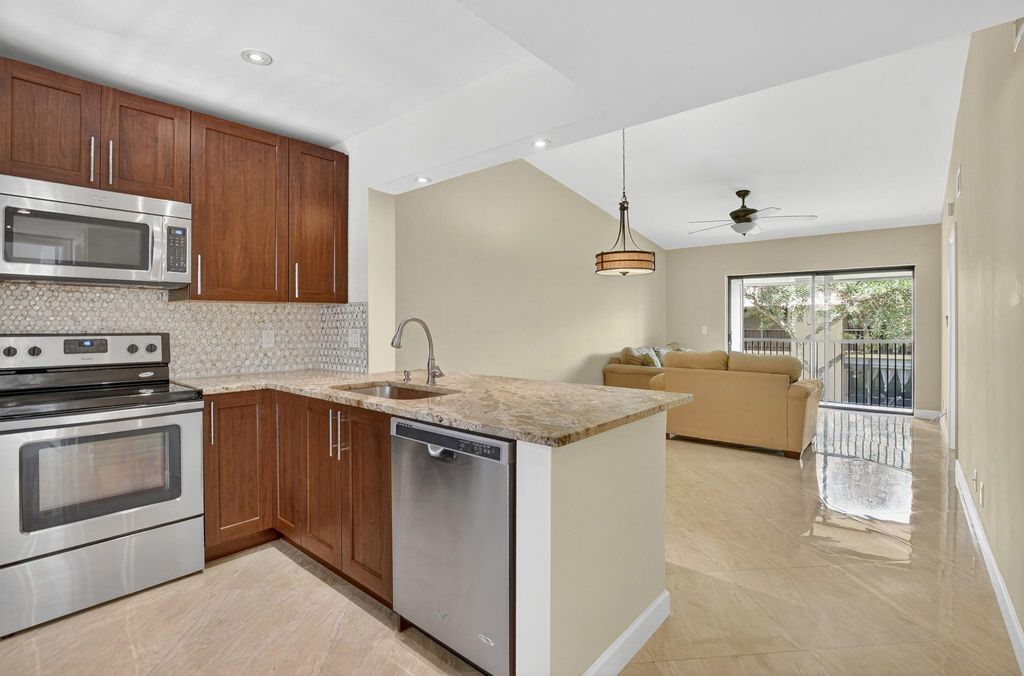 Photo of 21954 Tidewater Terrace #202, Boca Raton, FL 33433 (MLS # F10514439)