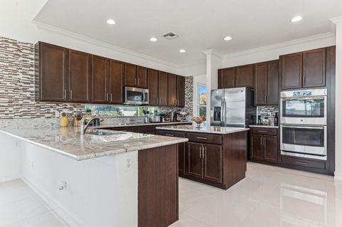 7733 Maywood Crest Drive Palm Beach Gardens FL 33412
