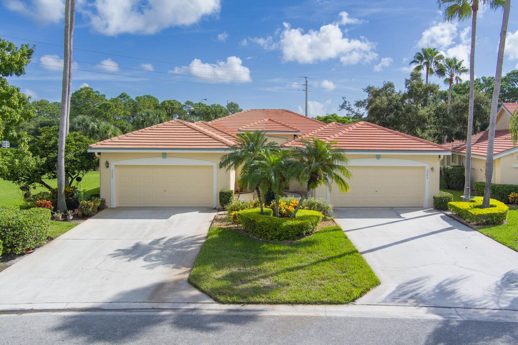 Photo of 3888 SW Whispering Sound Drive, Palm City, FL 34990 (MLS # R11020100)