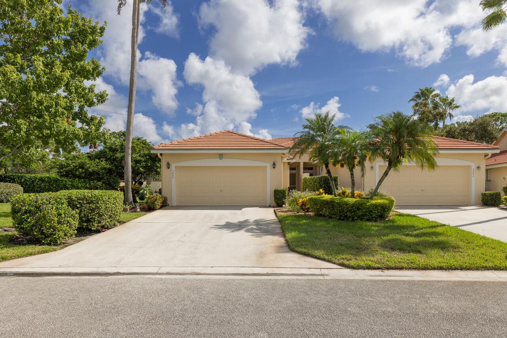 Photo of 3888 SW Whispering Sound Drive, Palm City, FL 34990 (MLS # R11020100)