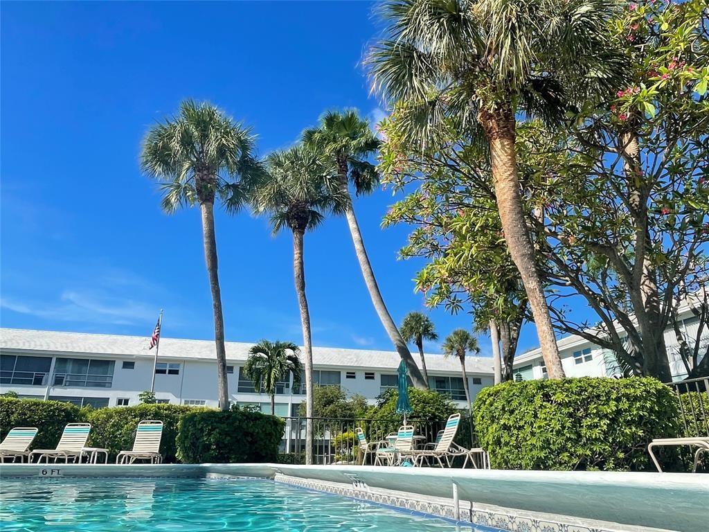 Your Florida Oasis! The 2/2-unit features Impact Storm Windows AND Accordion Shutters, with plenty of natural light creating a warm and inviting atmosphere. This 55+ active lifestyle community offers a very convenient location in Prestigious Lighthouse Point. Sip your morning coffee on the patio enjoying the lovely garden view. The clubhouse & pool offer relaxation & entertainment. Whether you enjoy swimming, shopping, fitness, or social gatherings, Lighthouse Point Gardens has something for everyone. Your private locked gate goes to the shopping center with restaurants, stores, Publix, post office and more! The library, police station, fire/ paramedic, bus & city shuttle are one block away. NO CAR NEEDED! However, your parking spot is right in front of your door, MOTIVATED SELLER!
