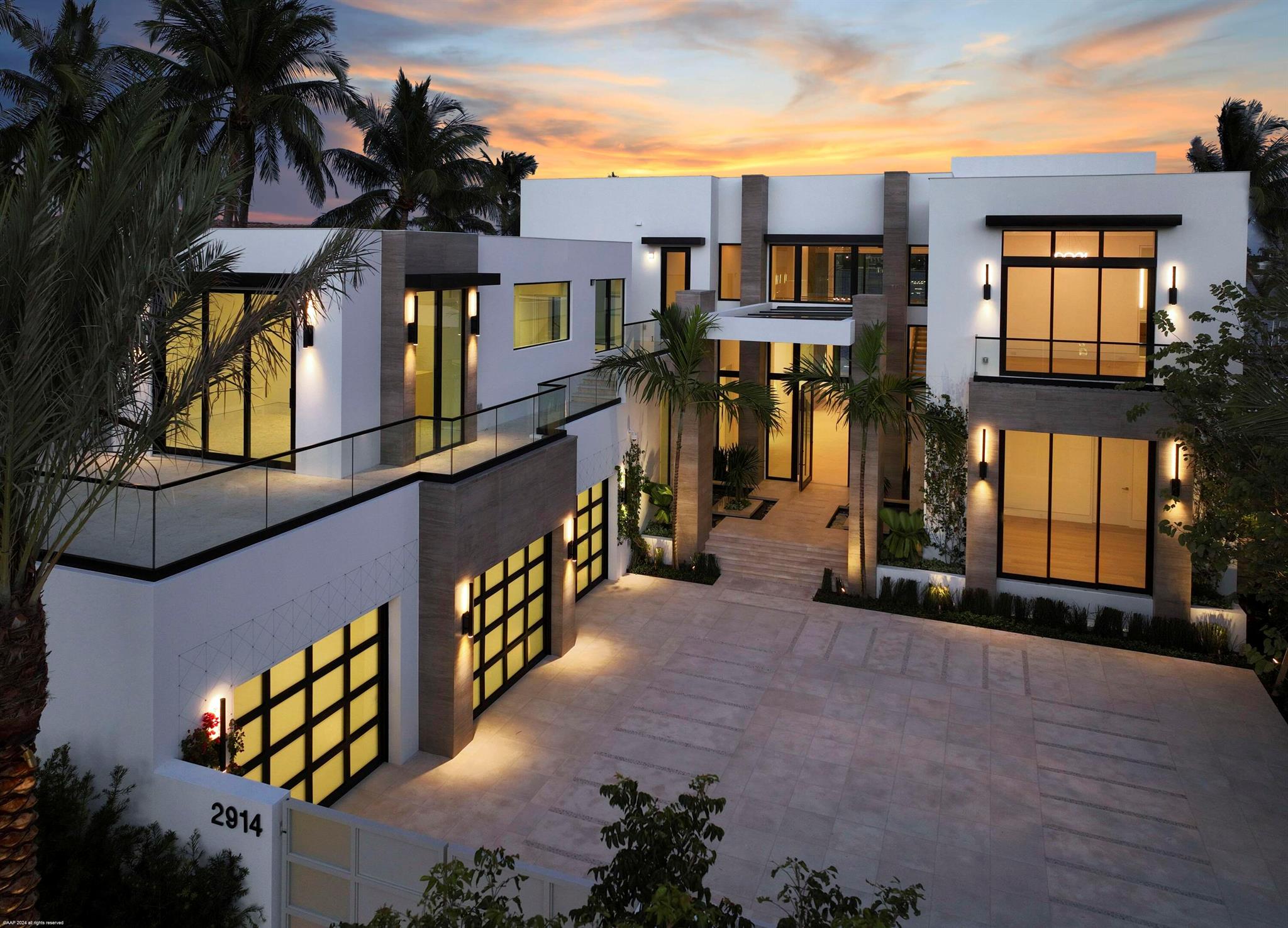 Spectacular new modern waterfront estate on the Intracoastal in West Palm Beach. Designed by architect David Lawrence, this 2024-built residence offers 12,730 total SF with 8,540 SF under air, featuring 7 bedrooms, 8 full baths, 2 half baths, elevator, 40' saltwater pool, spa, rooftop decks, fire pits, and summer kitchen. Elevated 10' above sea level on a 20,000 SF lot with 80' of direct waterfront, dock with 50k lb lift, no fixed bridges, and ocean access. Chef's kitchen, multiple living areas, media room, sauna, and in-law suite. Impact glass, 150KW whole-house generator, 3-car garage, and security system. No HOA. Minutes to beaches, Palm Beach Island, The Square, and PBI. A true Intracoastal showpiece.