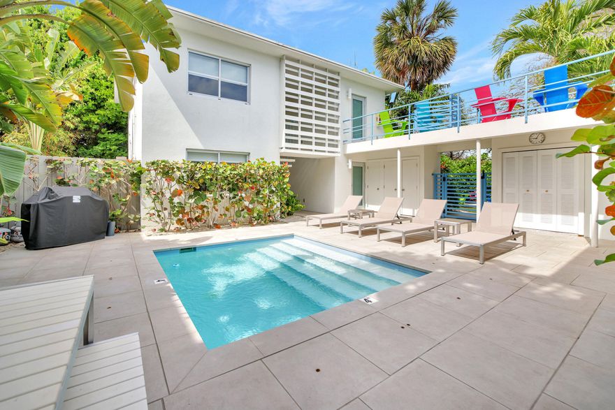 Discover a captivating Parkside Retreat - a meticulously renovated Mid-Century Fourplex, nestled within an expansive tropical oasis. Boasting two generous 2-bedroom/1-bathroom units alongside two cozy 1-bedroom/1-bathroom units, currently operating as sought-after short-term vacation rentals. Elegantly embracing the timeless charm of mid-century architecture, this property has undergone a stunning transformation. Every detail reflects a commitment to preserving the timeless charm and character of the property's mid-century design. From the tastefully updated kitchens and bathrooms to the installation of impact windows and doors, each element honors the essence of the era while seamlessly integrating modern comforts. A brand new roof has just been installed, further enhancing to impact windows and doors, every detail has been carefully curated to honor the property's heritage while introducing modern sophistication. A brand-new roof further enhances durability and curb appeal.
Linked by a charming catwalk, the two buildings open onto a tranquil outdoor haven, featuring terraces, a heated pool, and lush tropical landscaping  a private sanctuary perfect for relaxation and entertainment.
This versatile property offers unmatched potential: ideal for continued vacation rentals, long-term leasing, conversion into condos or townhomes, or even a live-work owner/tenant mix. Each unit is individually metered for electricity, ensuring convenience and flexibility for both owners and guests.
Superbly located between Las Olas Boulevard, Wilton Drive, and Fort Lauderdale Beach, Parkside Retreat provides unparalleled access to dining, nightlife, and the coast  all while maintaining a peaceful residential ambiance.
Don't miss this rare opportunity to own an extraordinary piece of paradise where timeless elegance meets modern convenience.