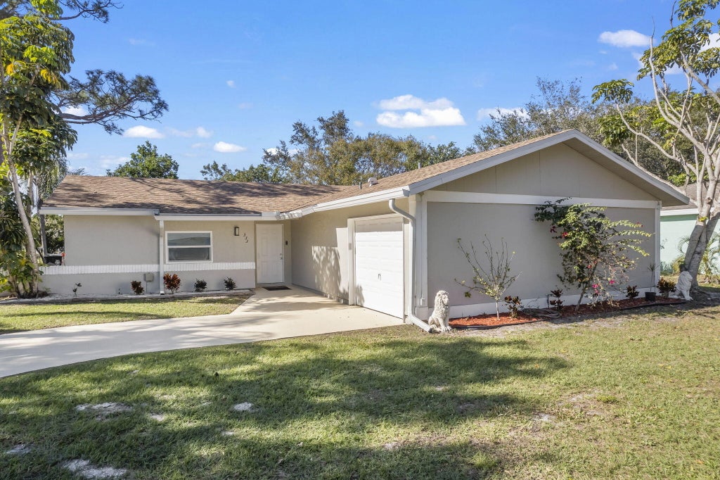 Photo of 333 SW Kentwood Road, Port Saint Lucie, FL 34953 (MLS # R11051151)