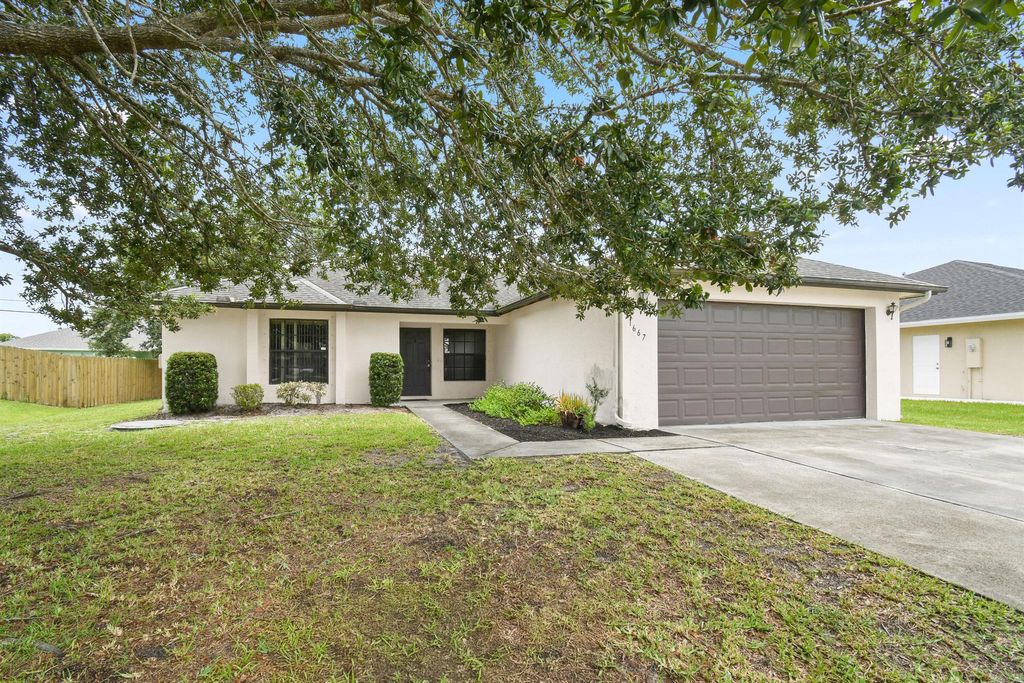 Photo of 1667 SW California Boulevard, Port Saint Lucie, FL 34953 (MLS # R11102889)