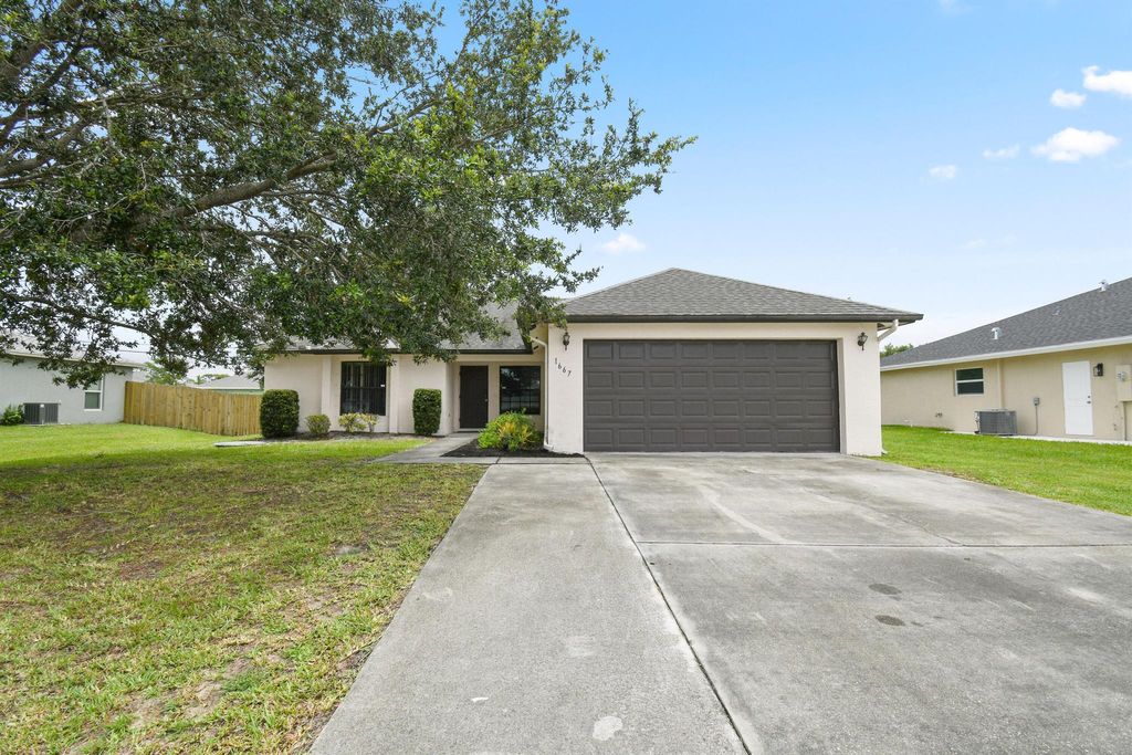 Photo of 1667 SW California Boulevard, Port Saint Lucie, FL 34953 (MLS # R11102889)