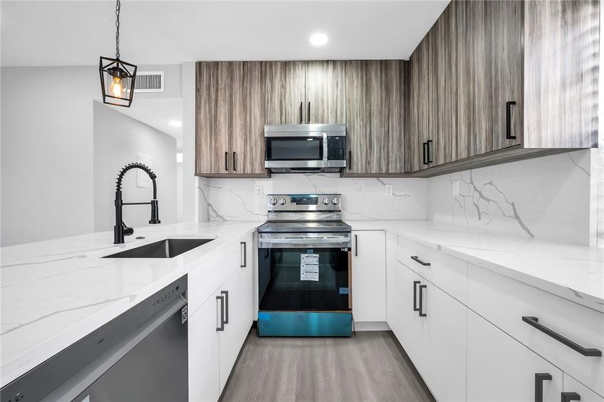 The best new listing in Kings Point, in one of the best constructed buildings and on the golf course! This unit includes recessed lighting throughout, and all new appliances. Beautiful garden, golf course and water feature view from screened in porch (roll down hurricane shutters) and direct golf course view from living room. New vinyl flooring throughout, with ceramic tile on porch and laundry area and bathrooms. Kitchen and baths have quartz counters. Both bathrooms have beautiful tiled showers with glass doors. Enjoy all the amenities at Kings Point Golf Resort and Golf Club including 4 heated pools, several clubhouses, restaurants, and bus service. Come live the life at this luxury 55+. Buyer one time community fee of $1800