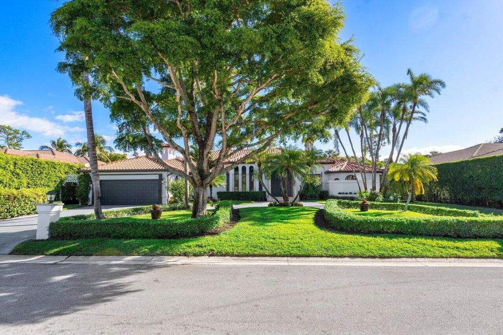 Photo of 598 N Country Club Drive, Atlantis, FL 33462 (MLS # R11131265)