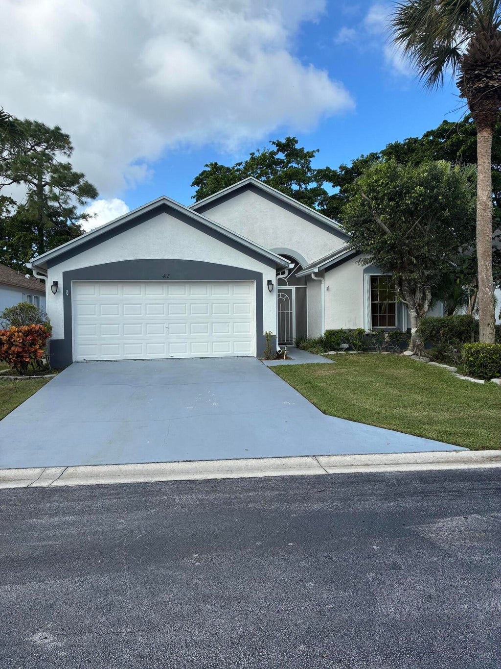Photo of 412 TROTTERS Lane, Greenacres, FL 33413 (MLS # B26094238)