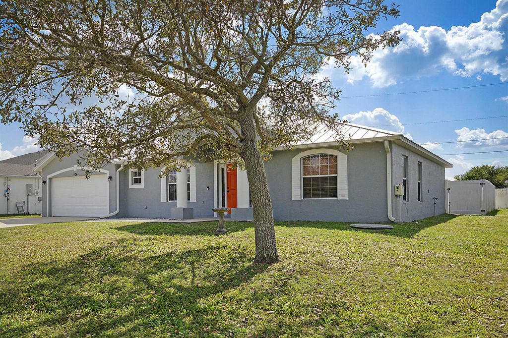 Photo of 504 SW Halibut Avenue, Port Saint Lucie, FL 34953 (MLS # R11062522)