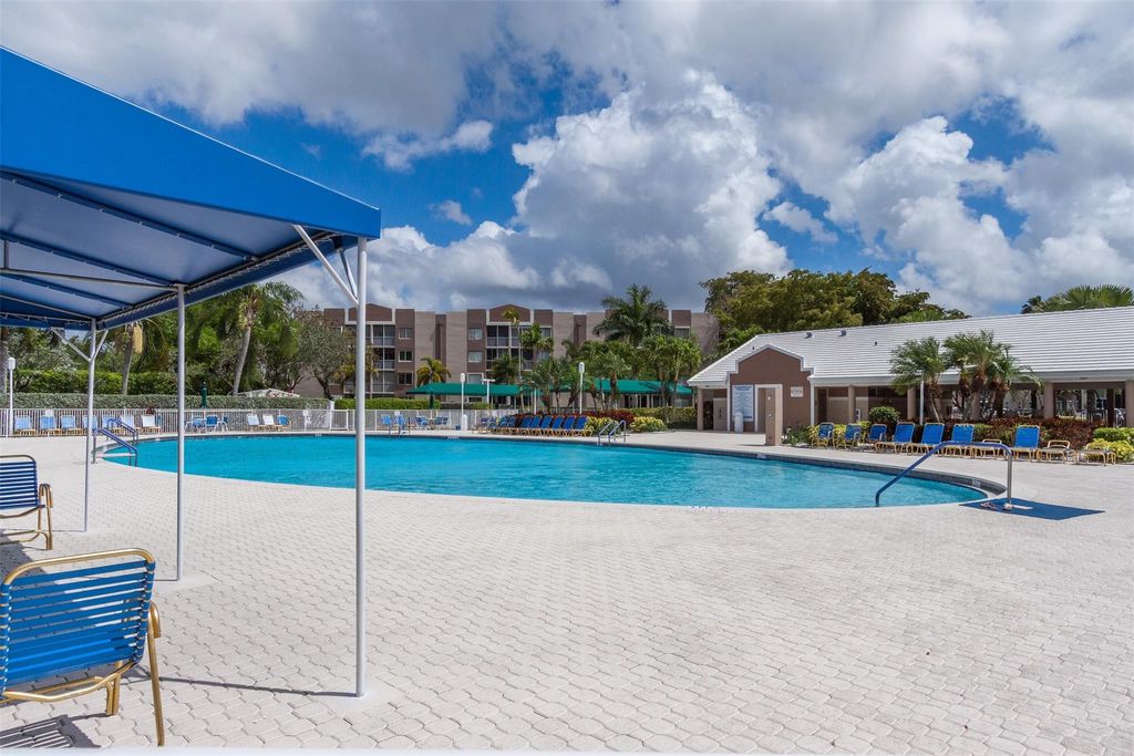 Photo of 7558 Trent Drive #304, Tamarac, FL 33321 (MLS # B26026697)