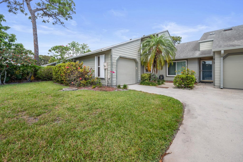 Photo of 911 NE Sandalwood Place, Jensen Beach, FL 34957 (MLS # R11088542)
