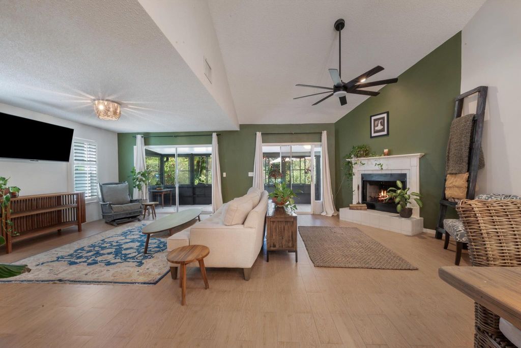 Photo of 911 NE Sandalwood Place, Jensen Beach, FL 34957 (MLS # R11088542)