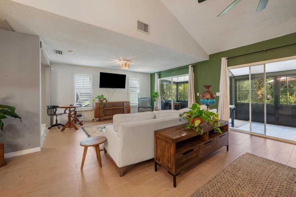 Photo of 911 NE Sandalwood Place, Jensen Beach, FL 34957 (MLS # R11088542)