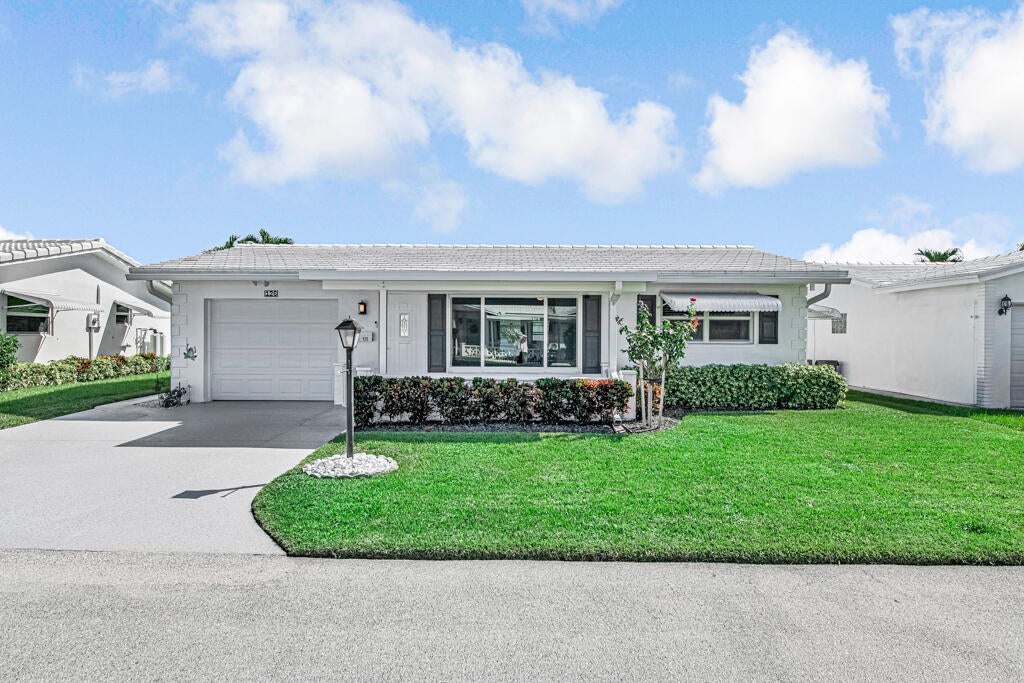 Photo of 126 NW 14TH Street, Boynton Beach, FL 33426 (MLS # B26091306)