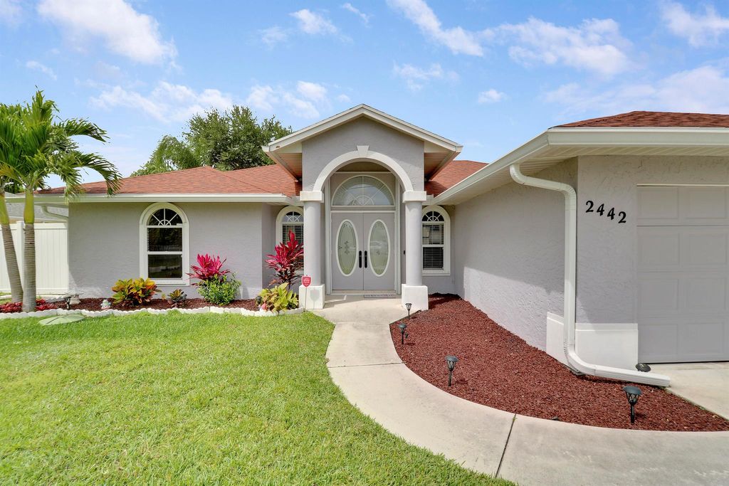 Photo of 2442 SW Dalpina Road, Port Saint Lucie, FL 34953 (MLS # R11080609)