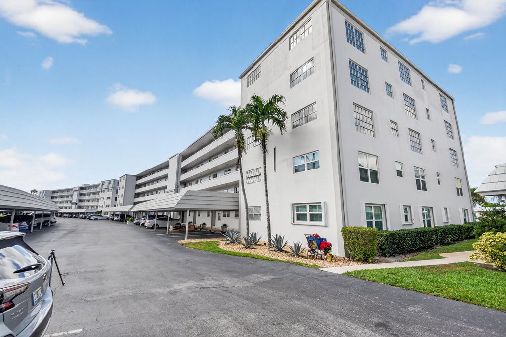 Photo of 250 John F Kennedy Drive #302, Atlantis, FL 33462 (MLS # R11154152)