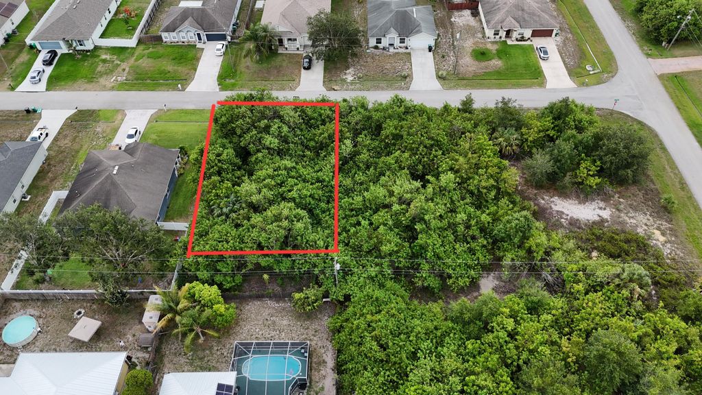 Photo of 4656 SW Osborne Street, Port St Lucie, FL 34953 (MLS # R10995095)
