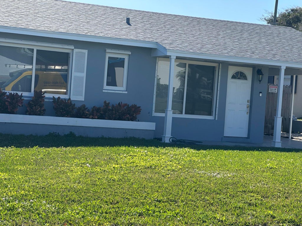 Photo of 1092 Florence Road, Lantana, FL 33462 (MLS # R11145442)