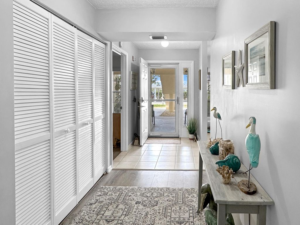 Photo of 720 Lake Orchid Circle #102, Vero Beach, FL 32962 (MLS # R11161215)