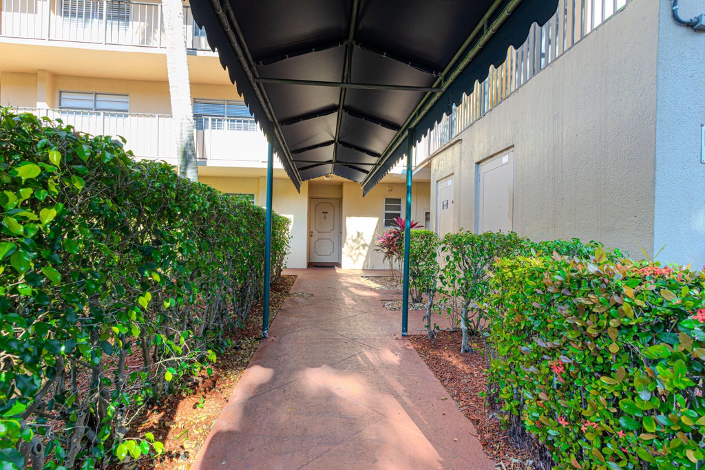 Photo of 3810 Via Poinciana #104, Lake Worth, FL 33467 (MLS # R11074149)