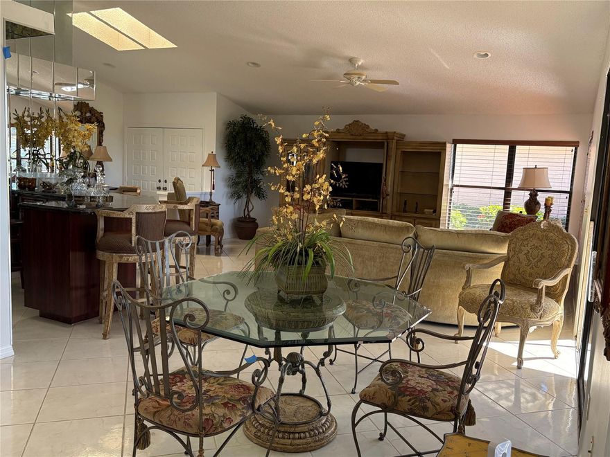 A RARE FIND....ONLY HOUSE currently available for rent in Gleneagles. Fully furnished 2 bedrooms, 2 bath, plus office/den (can convert to bedroom) and a GARAGE! Light and bright with beautiful golf course view from home and screened patio. House features open floor plan with tile and all bedrooms newly carpeted. Close walk to all resort-style amenities: Clubhouse, Restaurants and Lounges, two 18-holes Golf Courses and practice facilities, Card Rooms, Pickleball, Tennis, Healthy Lifestyle Fitness Center and Spa.  Rent includes privileges of full Club membership, wifi, and cable.