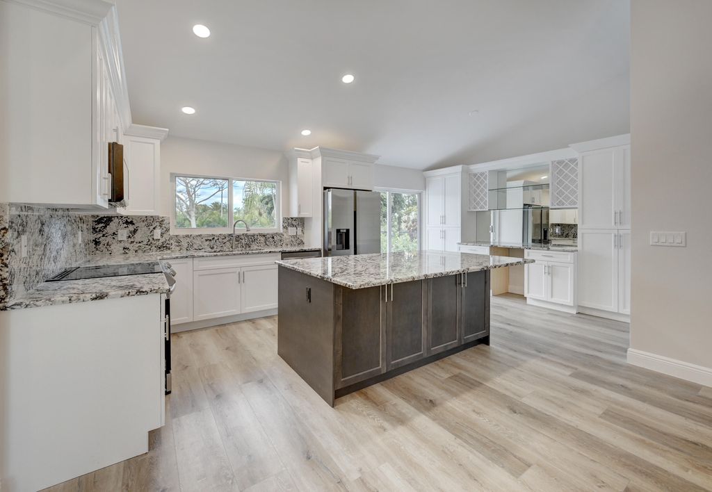 Photo of 9320 Sun Pointe Drive, Boynton Beach, FL 33437 (MLS # R11166110)