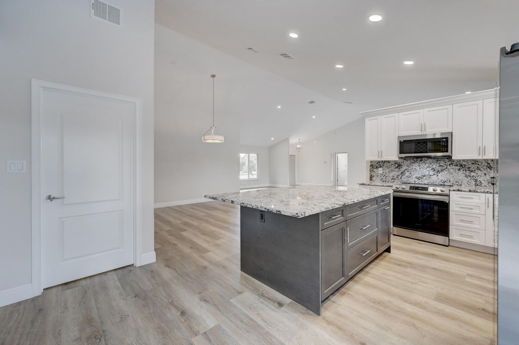 Photo of 9320 Sun Pointe Drive, Boynton Beach, FL 33437 (MLS # R11166110)