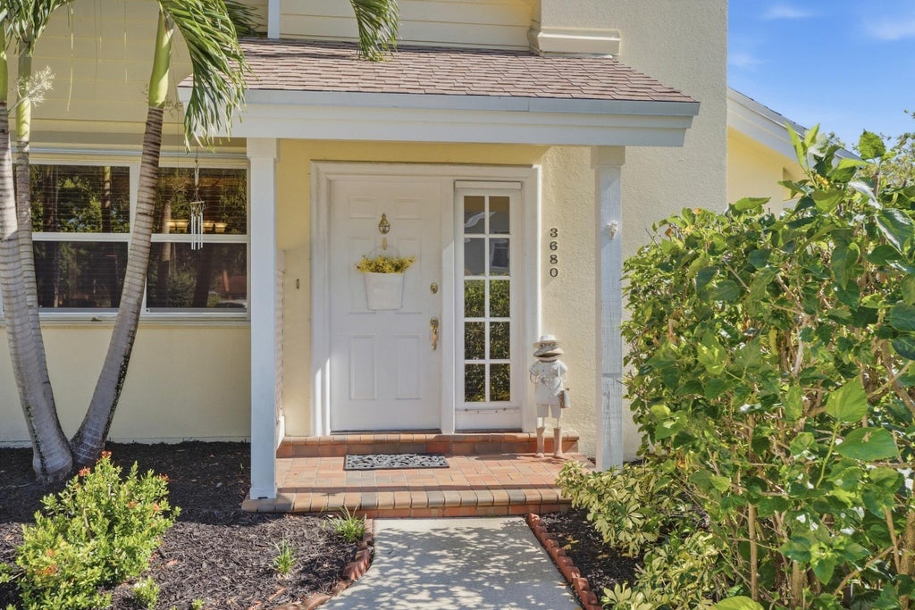 Photo of 3680 SW Sunset Trace Circle, Palm City, FL 34990 (MLS # B26077679)
