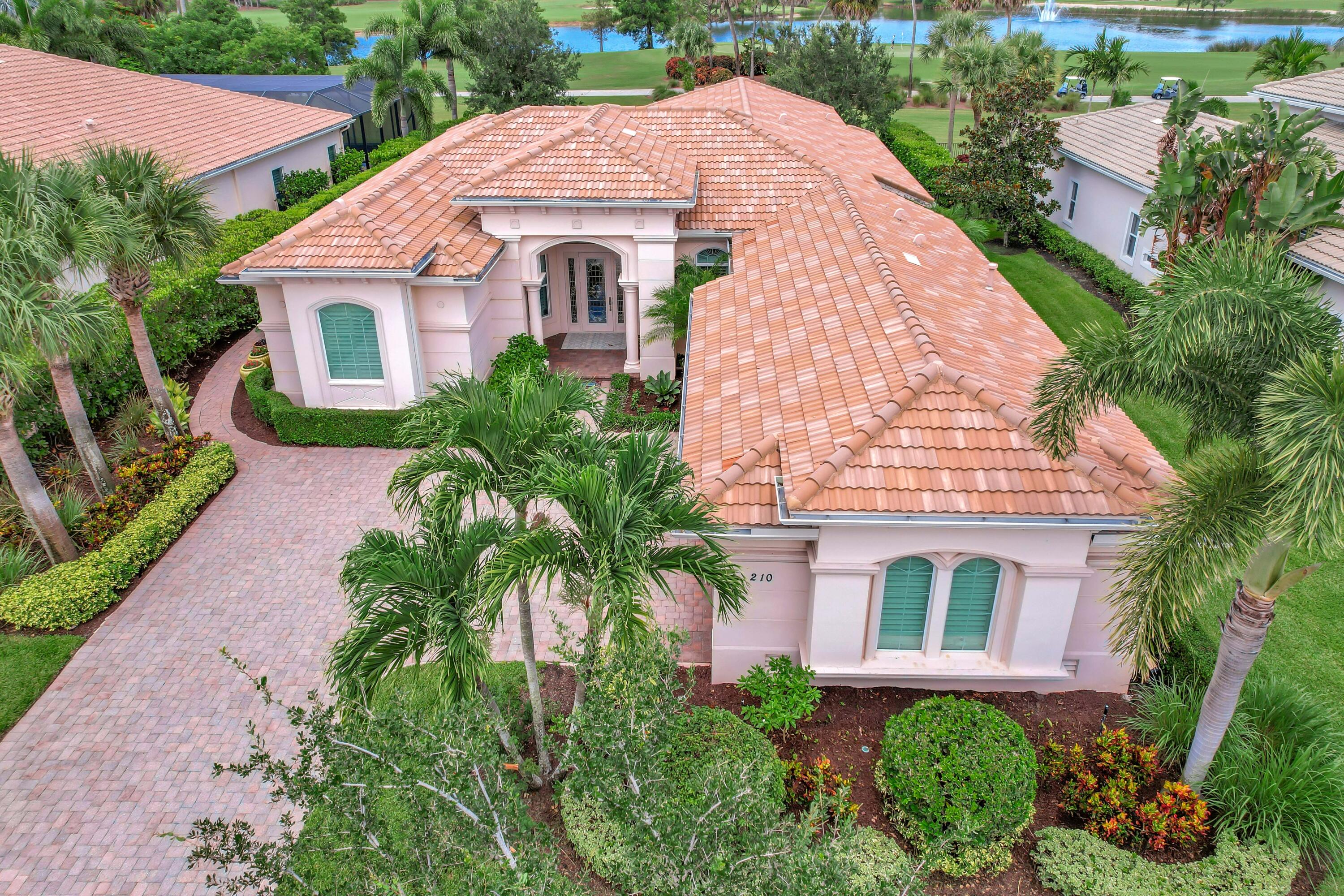 Welcome home to this immaculate 4-bedroom, 4 Bath, one-story expanded Castania model in the prestigious Jupiter Country Club. Enjoy maintenance-free living in a well-planned layout featuring an expanded family room, refined finishes with 5-inch crown molding in every room. The kitchen is ideal for both quiet mornings & entertaining, with a gas cooktop, top-tier appliances, and beautifully glazed cabinetry. Premium upgrades enhance style and function in every space. The expanded 25-ft master suite offers a true retreat with space to relax and recharge. Step outside to your private tropical paradise--complete with a large patio, covered lanai, retractable awning, & beautiful pool overlooking the 6th hole. This home offers the ultimate in comfort and elegance within a resort style community.