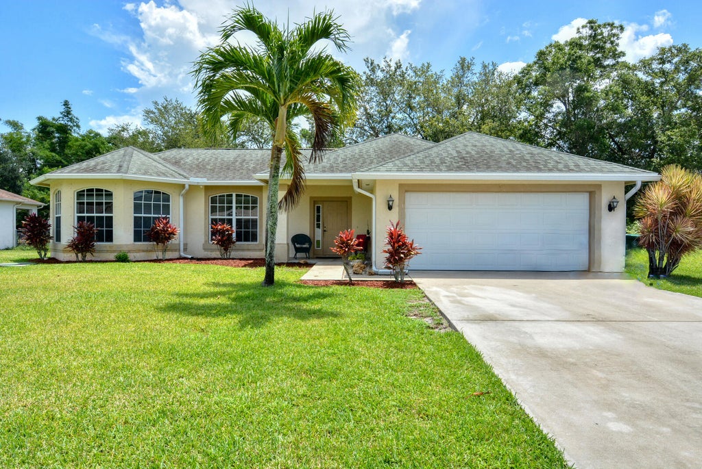Photo of 1139 SW Ivanhoe Street, Port Saint Lucie, FL 34983 (MLS # R10805839)