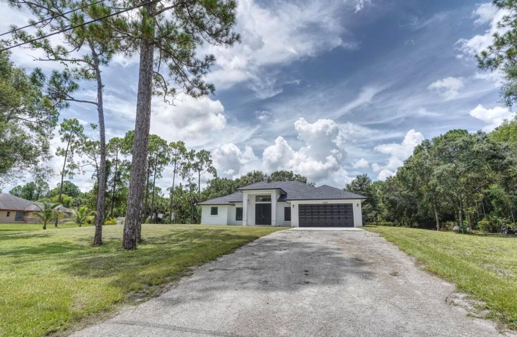 Photo of 16876 69th Street N, The Acreage, FL 33470 (MLS # R10901768)