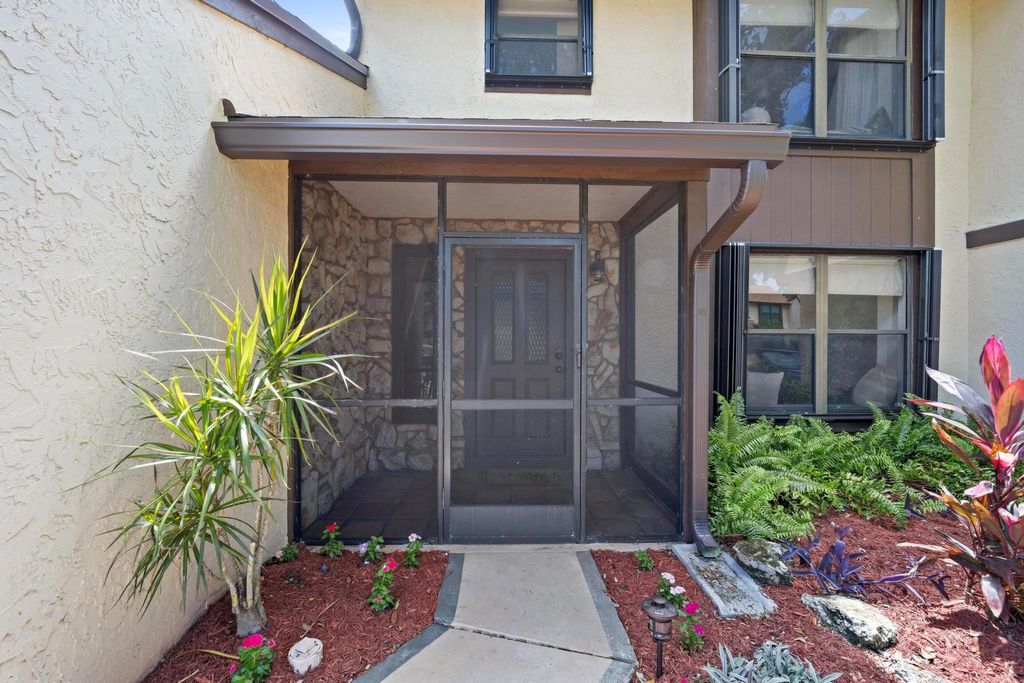 Photo of 1088 Raintree Drive, Palm Beach Gardens, FL 33410 (MLS # F10447147)