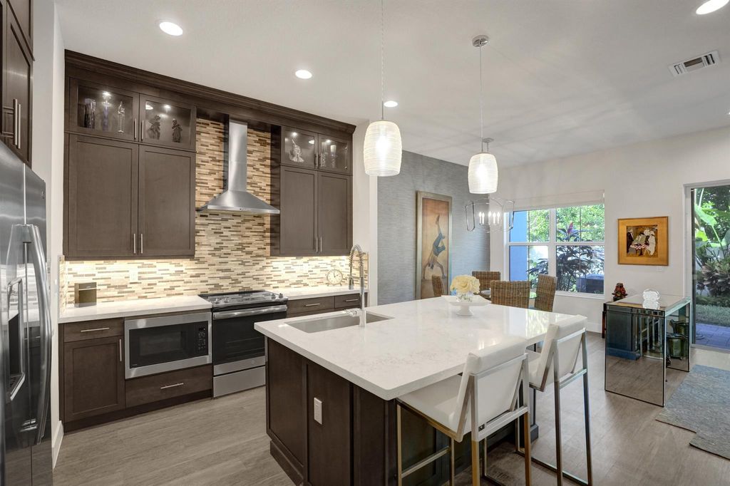 Photo of 4833 Pointe Midtown Road, Palm Beach Gardens, FL 33418 (MLS # R10992041)