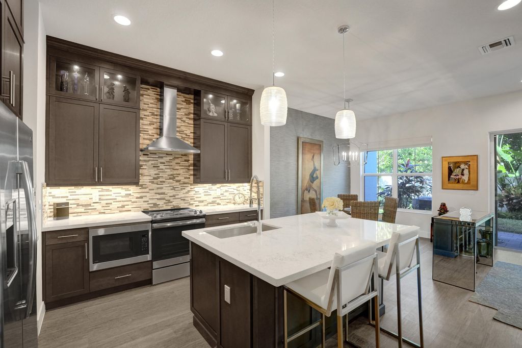 Photo of 4833 Pointe Midtown Road, Palm Beach Gardens, FL 33418 (MLS # R10992041)