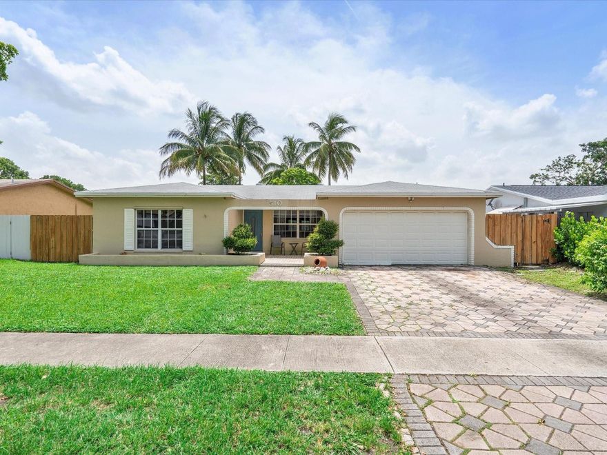 Spacious 3 Bedroom 2 Bathroom Lakefront Home With Pool! This home features tile flooring in the main living spaces, a large primary suite that leads out to the pool, and water views from all main living spaces.  The kitchen has ample space with granite counters, stainless steel appliances and is partially open to dining & living rooms.  Outside there is a brick-paved covered patio and pool surround, stained pergola for gazing on the lake, and plenty of greenspace.  You also have the option of enjoying additional under-air living square footage in the converted two-car garage or to use it as a garage.  The roof is approximately 7 yrs, HVAC 3 yrs and hotwater tank 2 years.