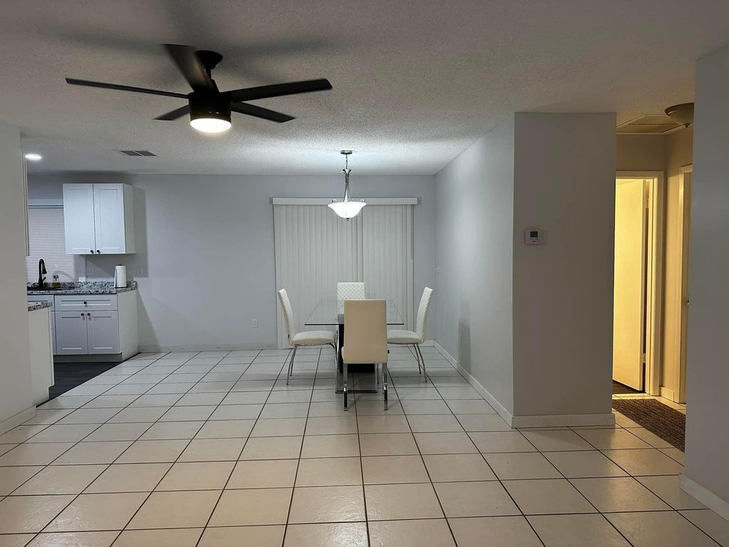 Photo of 141 SW Duval Avenue, Port Saint Lucie, FL 34983 (MLS # R11071314)