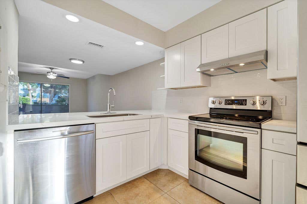 Photo of 6207 Riverwalk Lane #5, Jupiter, FL 33458 (MLS # B26068398)
