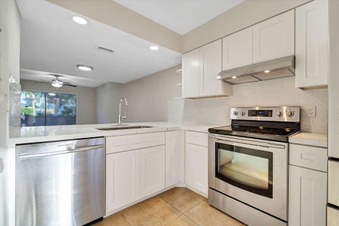 Photo of 6207 Riverwalk Lane #5, Jupiter, FL 33458 (MLS # B26068398)